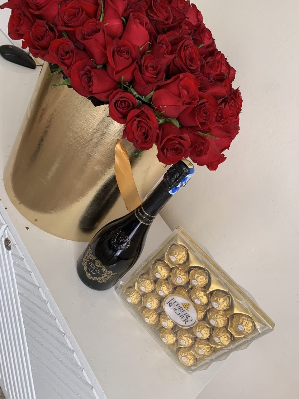 Luxury bucket Bouquet plus wine of your choice